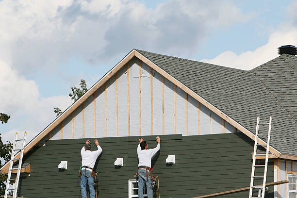 Professional Emergency Siding Repair technician working in Newark, IL